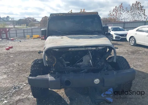 2011 Jeep Wrangler Sport z USA, uszkodzony, nr VIN 1J4AA2D17BL637575